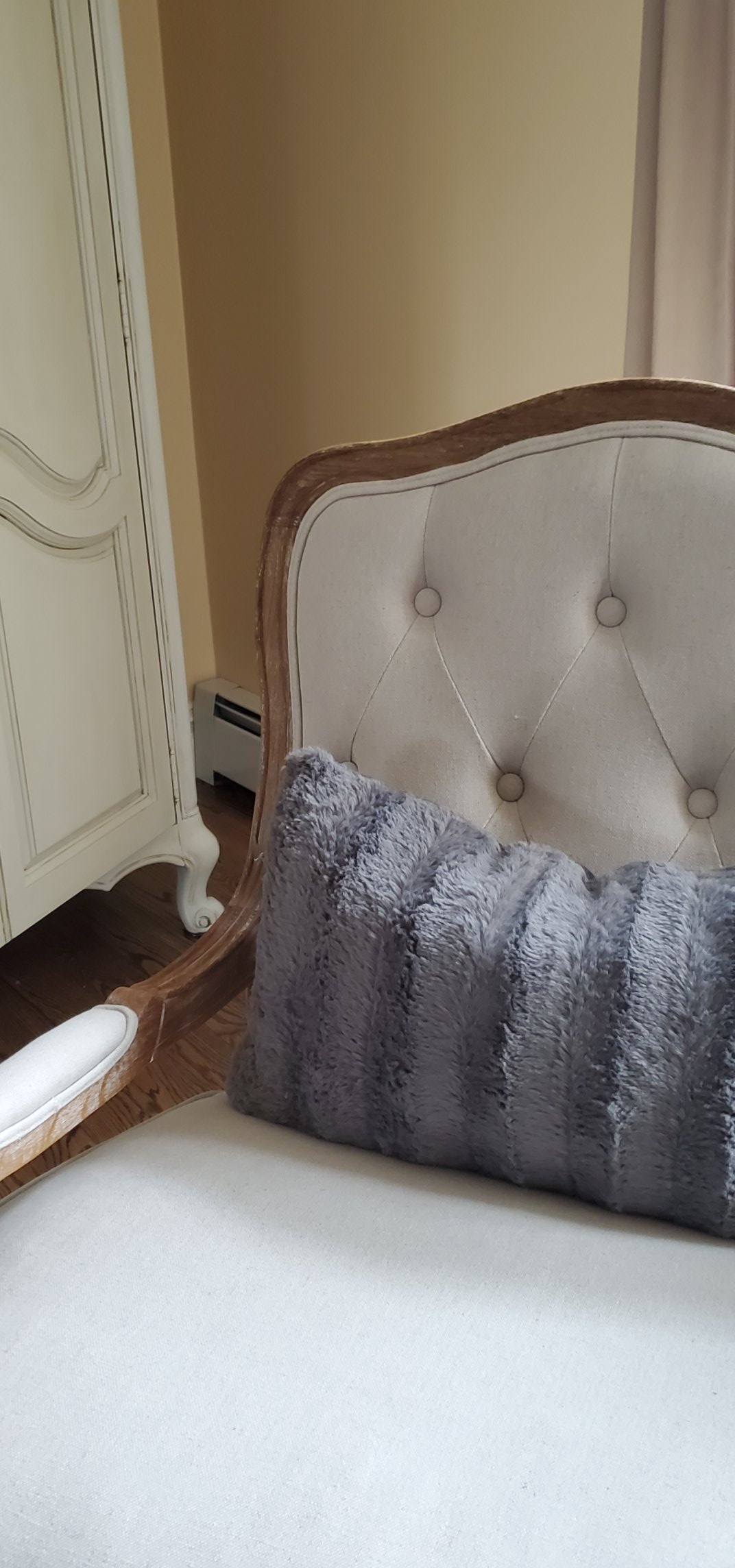 a chair cozy for winter wwith a faux fur pillow