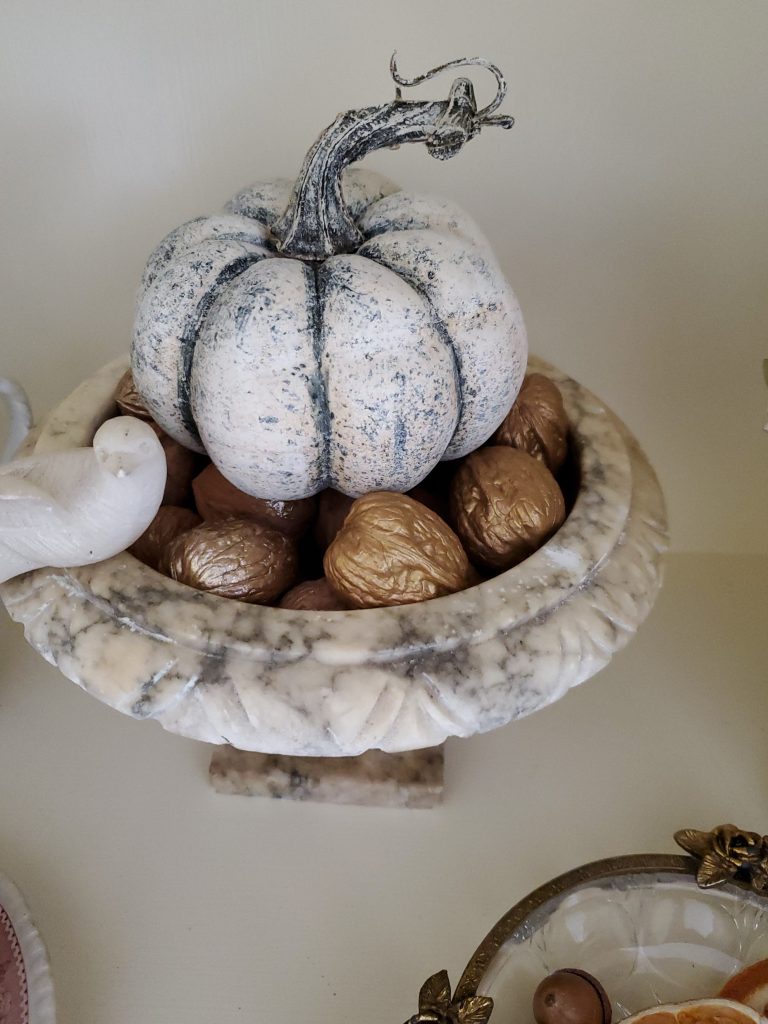 finished pumpkin on top of walnuts