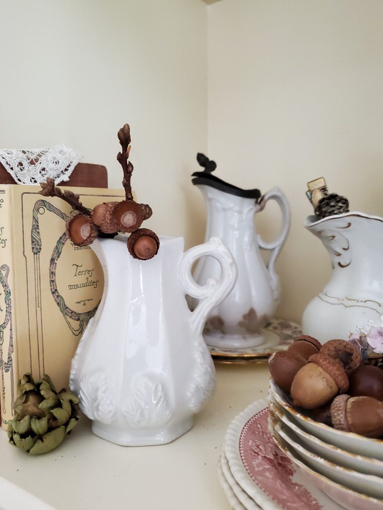 decorating shelves for fall real branches with acorn caps