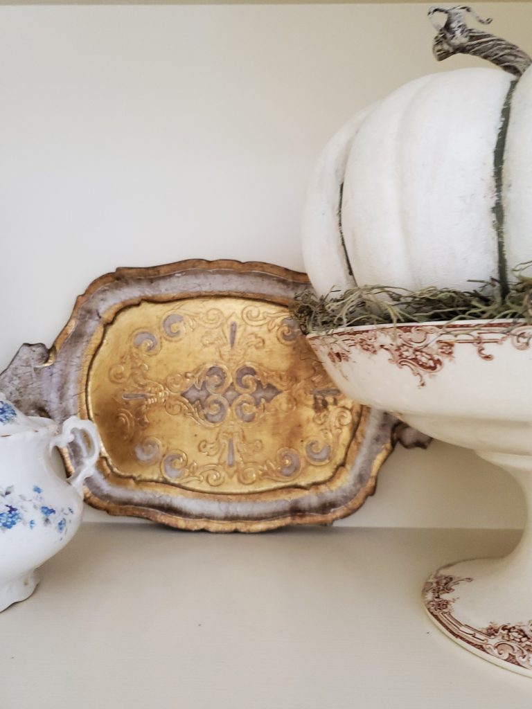 Florentine plate on shelf