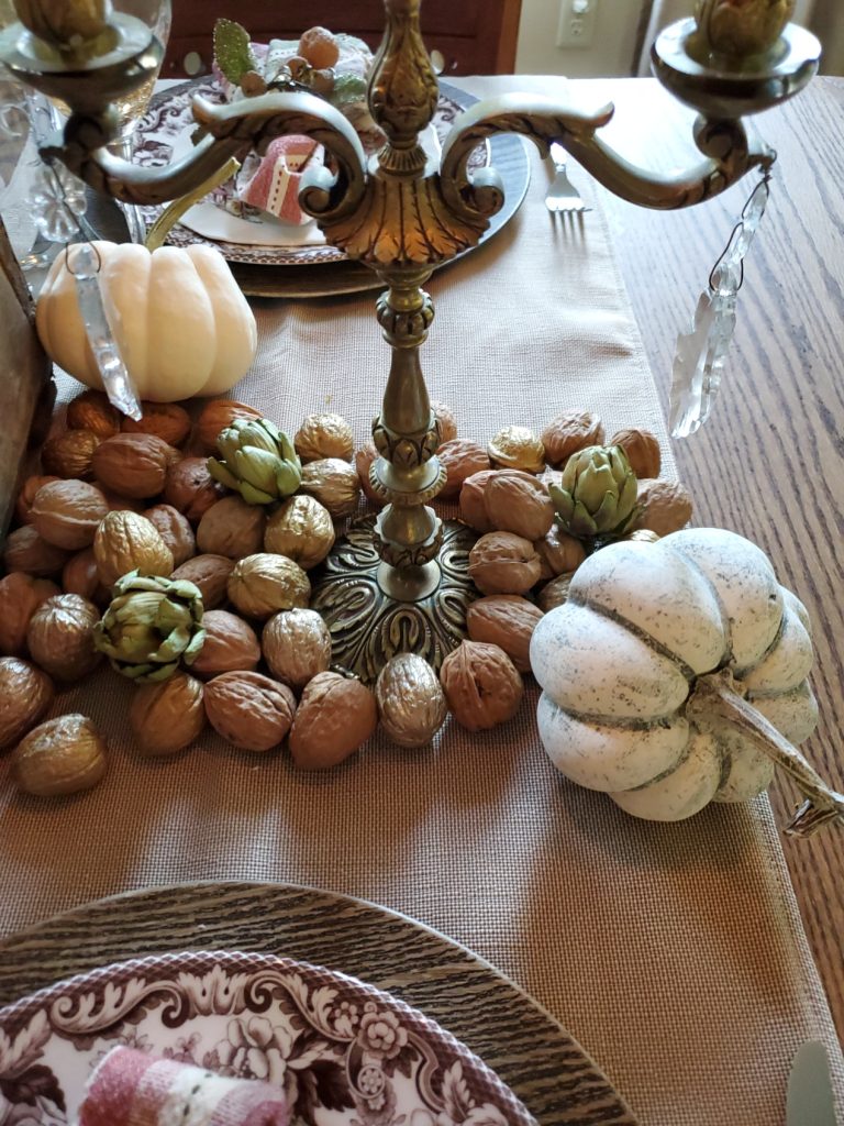 nuts in the shell, dried artichokes and small pumpkins