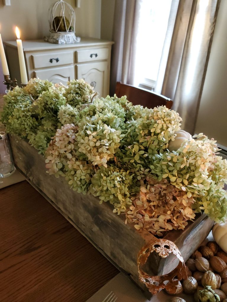 centerpiece filled with dried hydrangeas