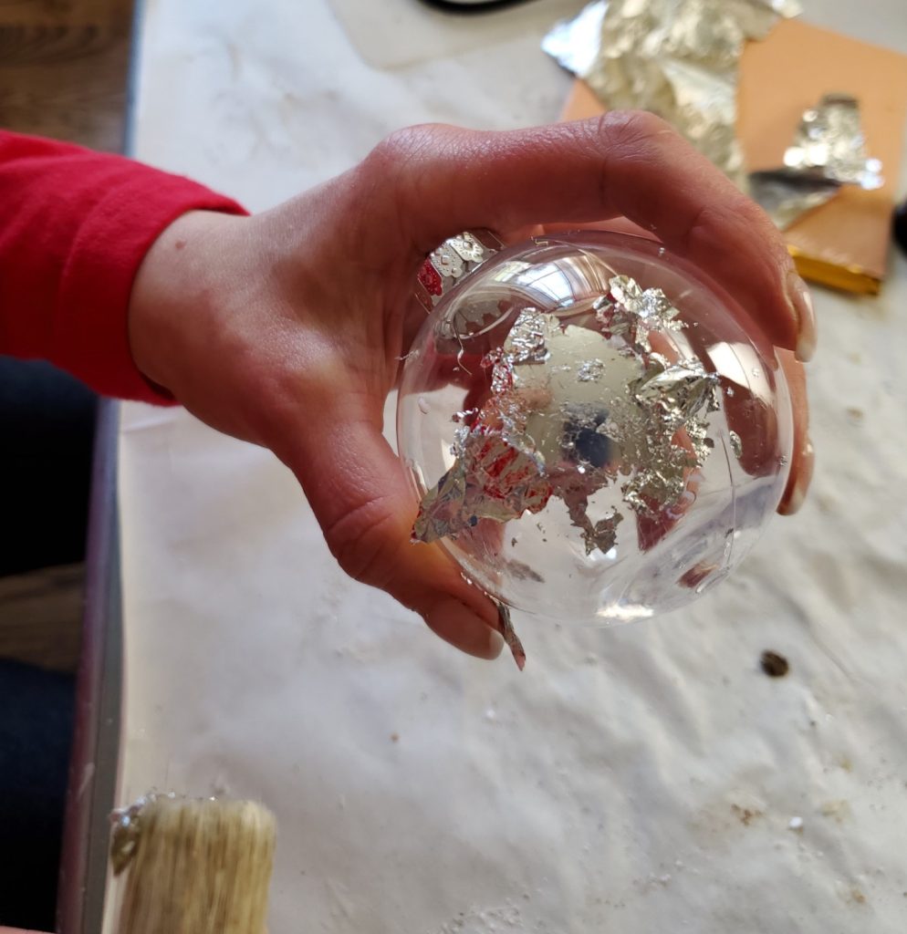 showing the first bit of silver on the ornament