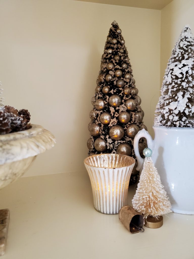 Close of bottle brush trees on the shelves