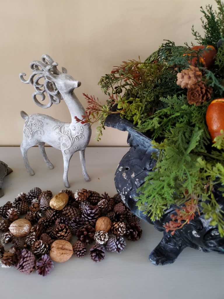 Updated deer with paint and pinecones and walnuts