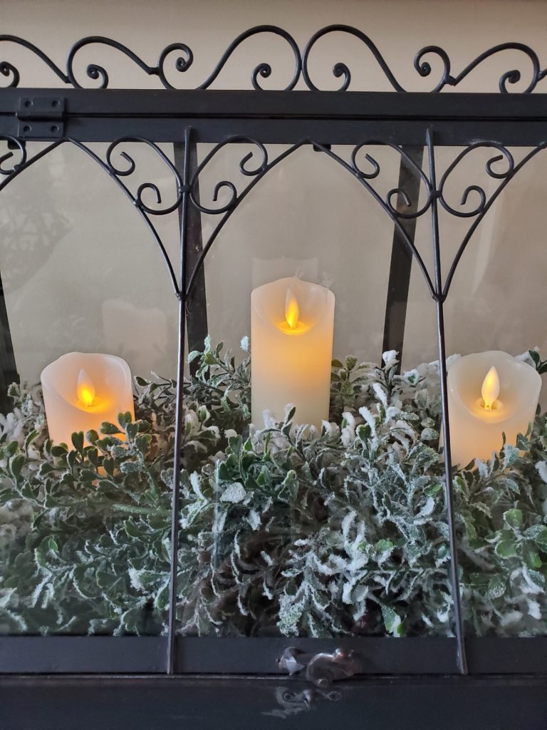 close up of pillar candles lit