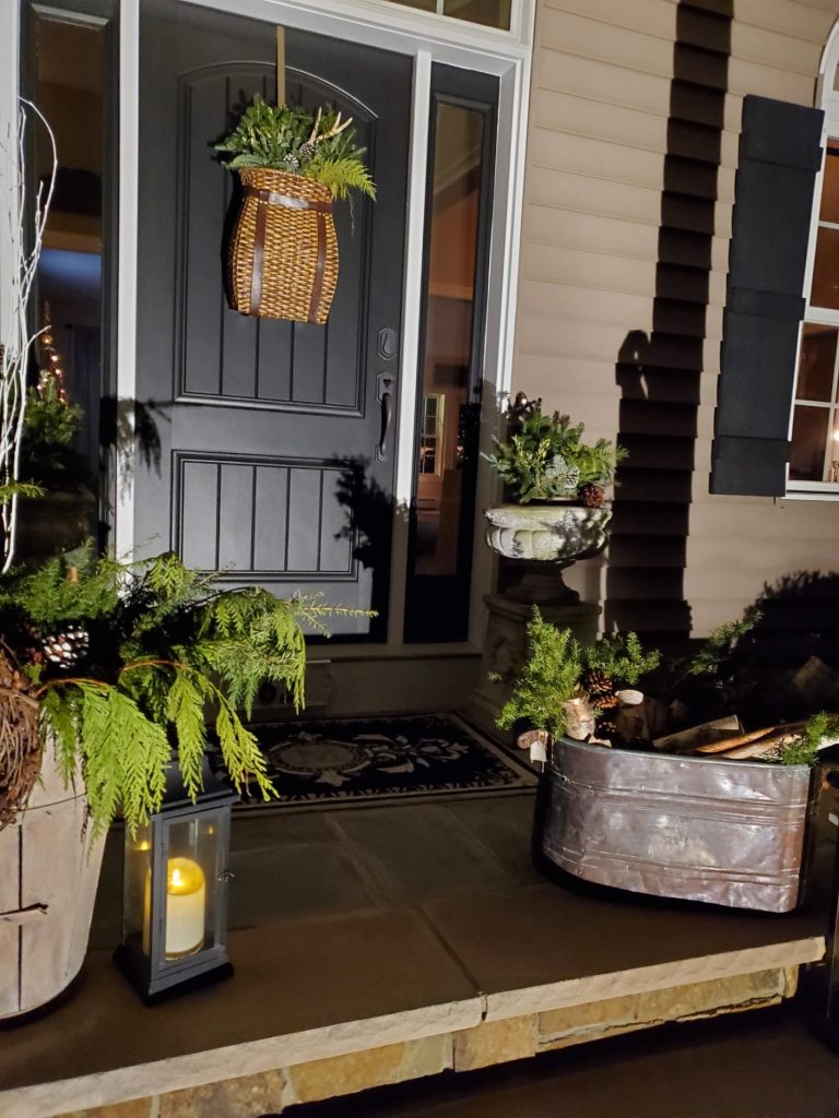the Christmas porch lit up at night