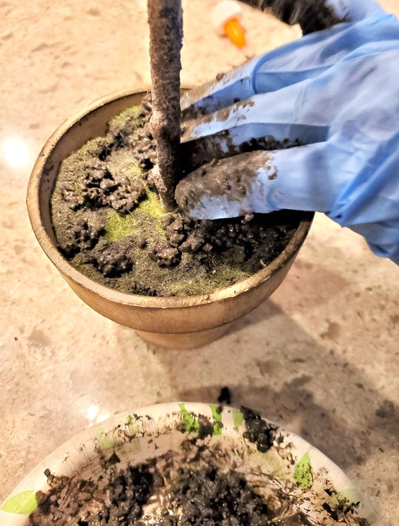 adding-my-dirt-i-made-to-the-inside-part-of-pot