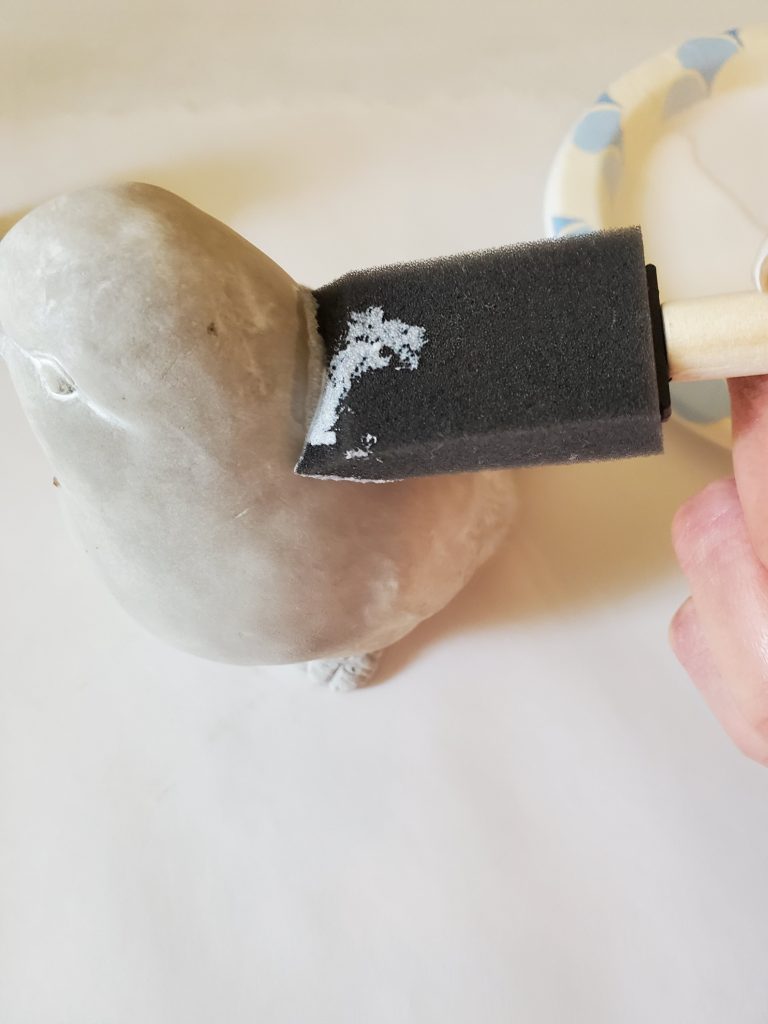 adding the glue for the bird craft