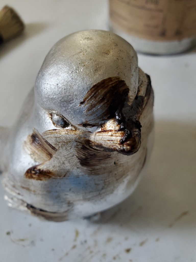 showing the wax before rubbed into the bird