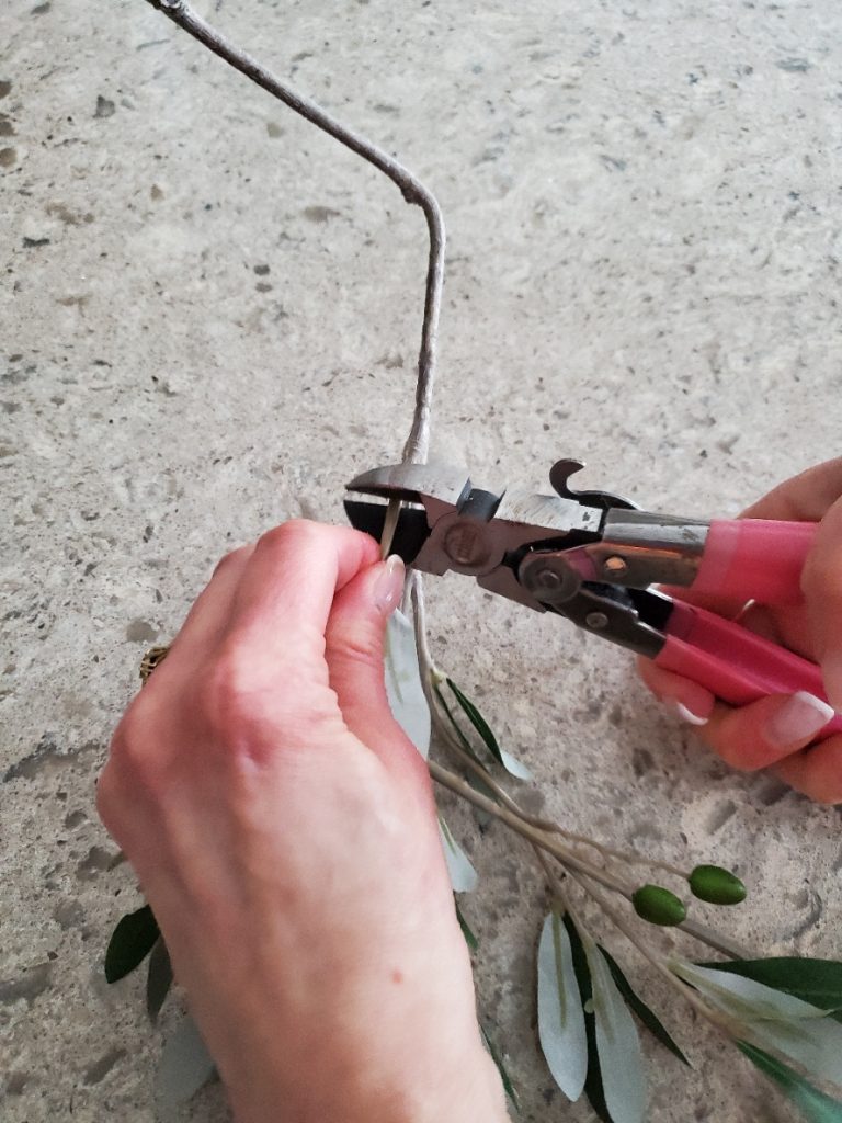 cutting the stem with wire cutters