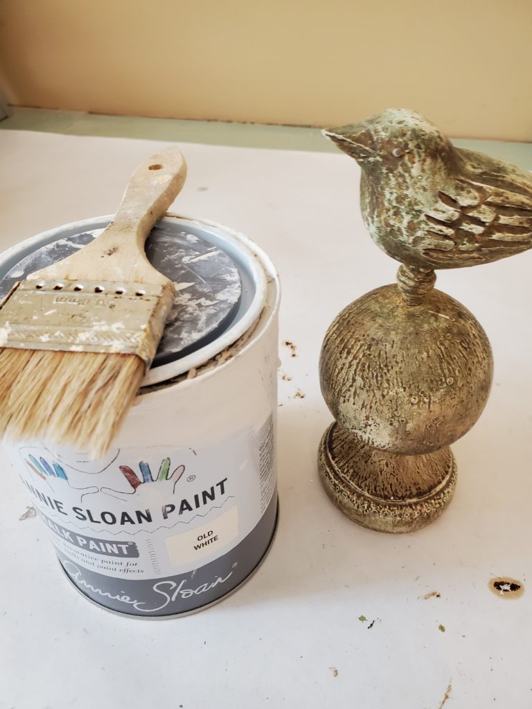 a bird finial getting updated