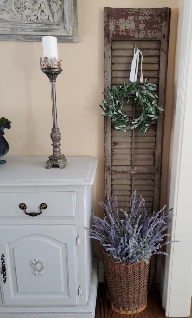 wreath hanging and basket filled with lavender