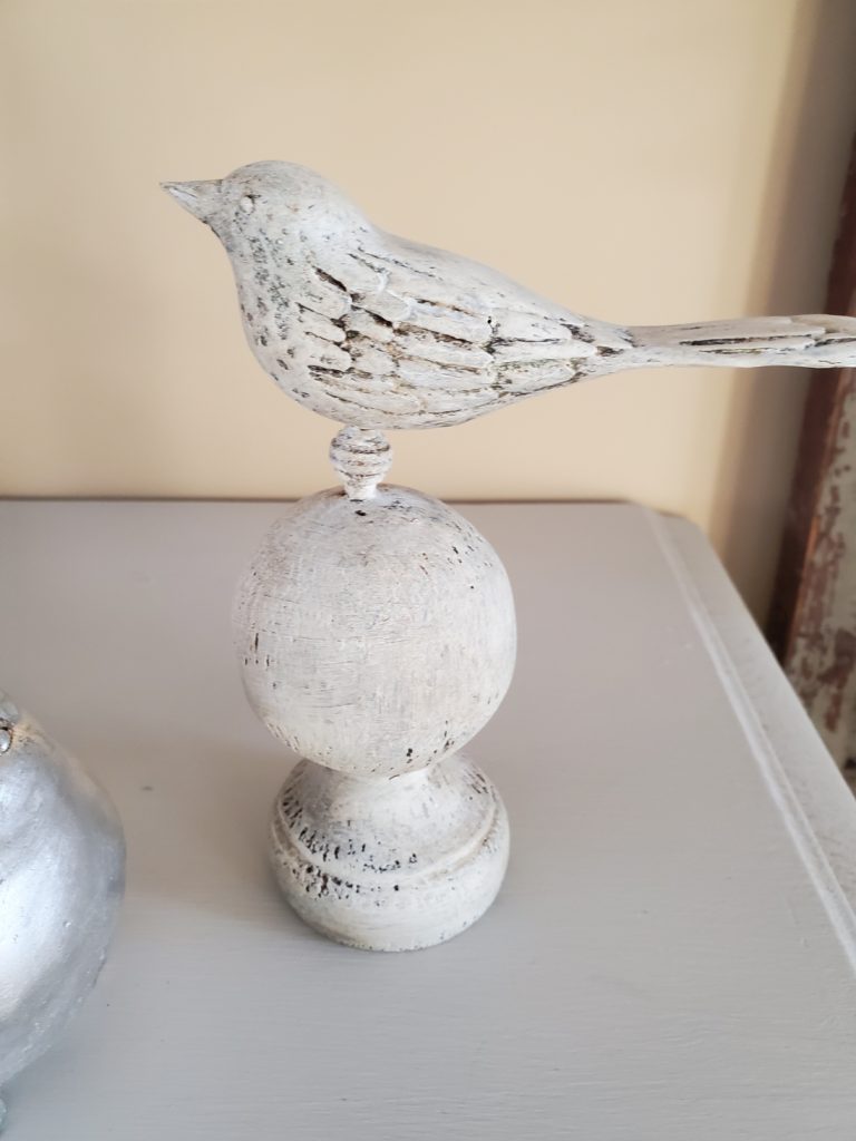 the finial on a cabinet top