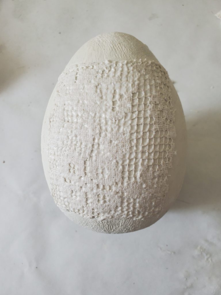 Easter Egg Crafts after the lace is added using Mod Podge and a sponge brush