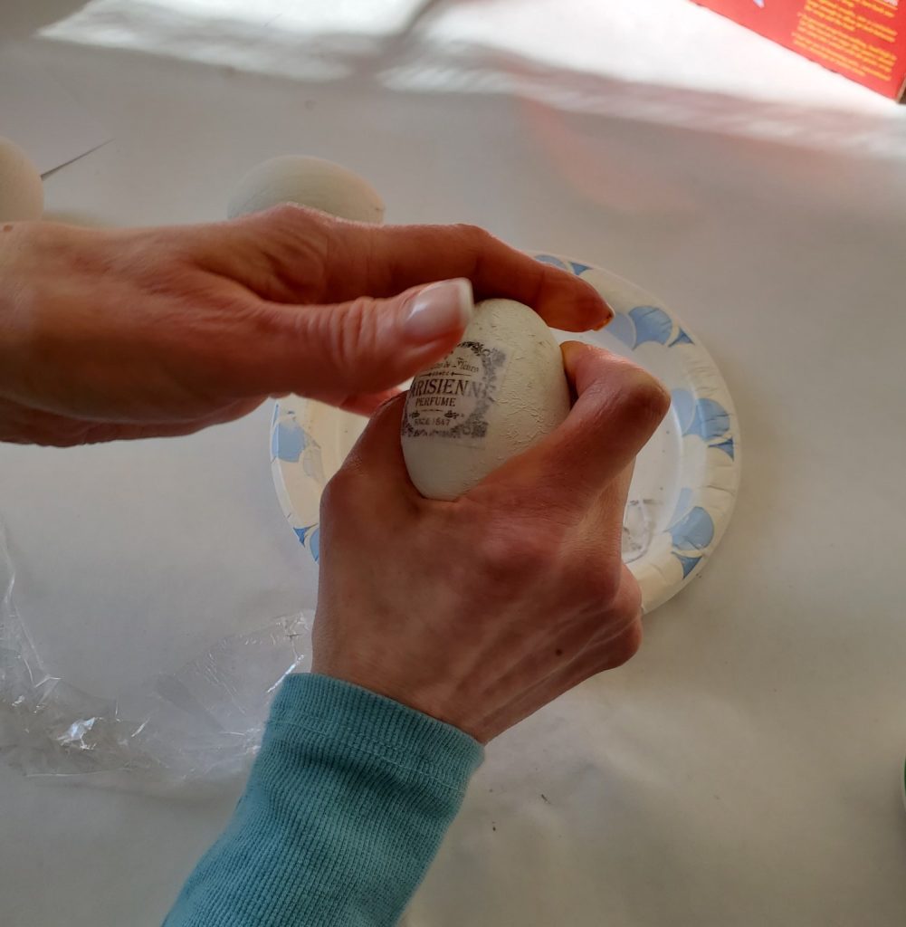 removing the rest of the top layer of paper