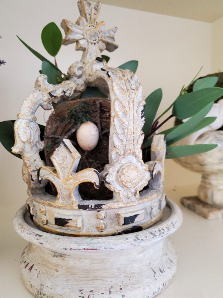 crown filled with a bird nest