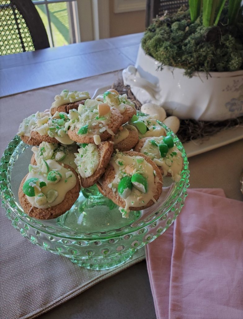a cake stand with cookies for a simple spring home tour