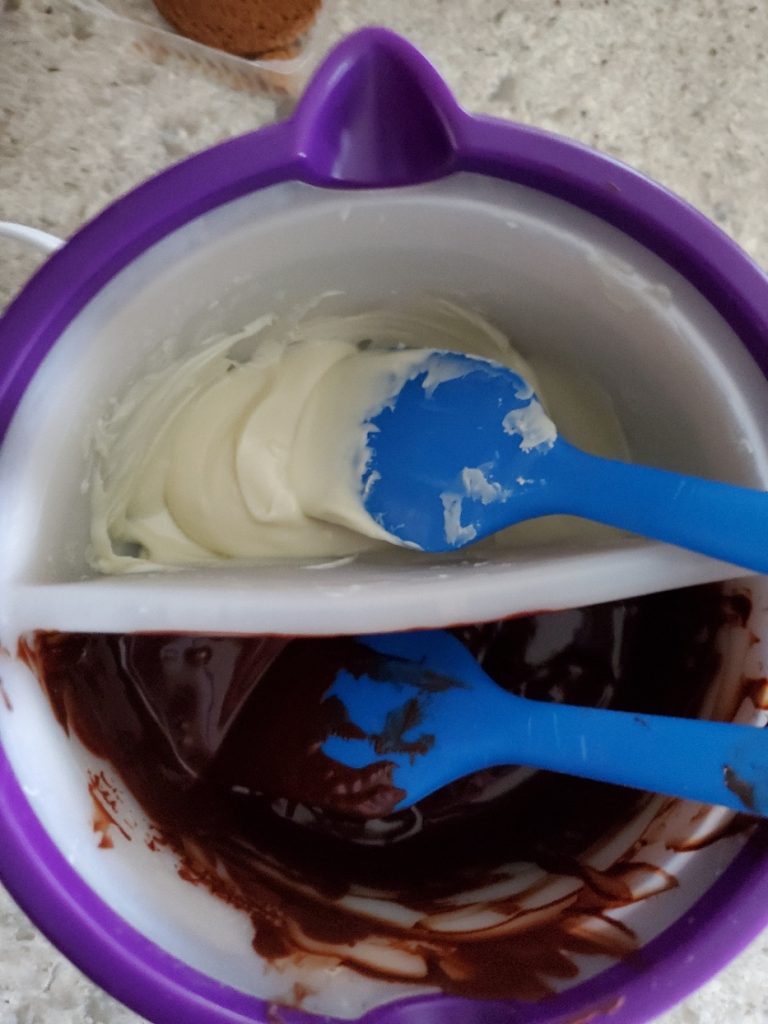 showing white chocolate and dark chocolate melted for Mother's Day in the garden