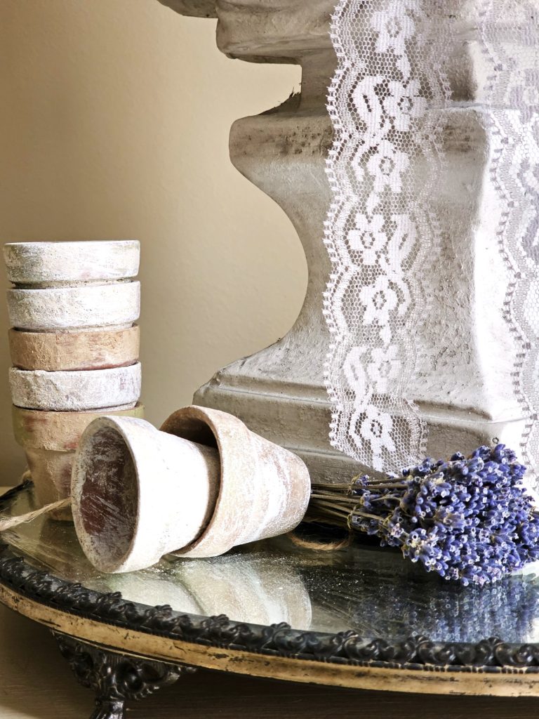 small-pots-and-dried-lavender-on-a-mirror