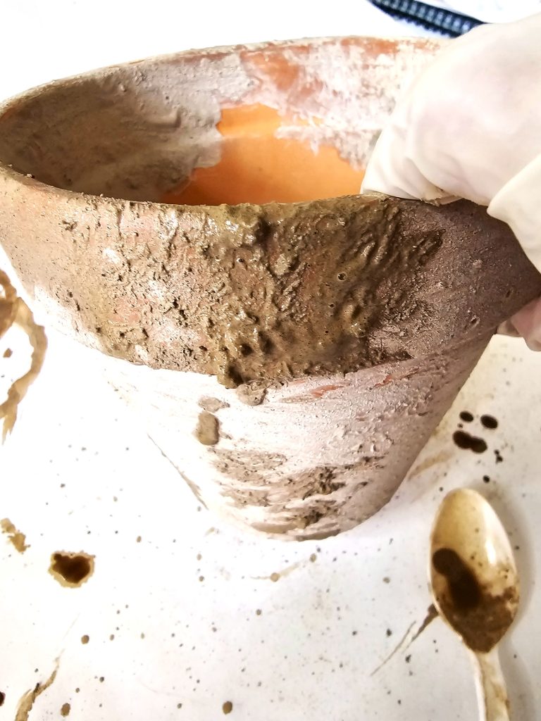 hurry-easily-age-terracotta-pots-using-lime-showing-the-lime-addedd-heavier-on-rim-of-pot