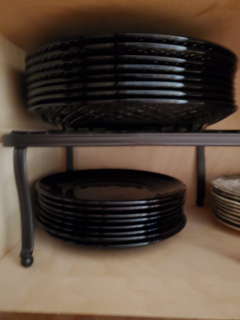 Stacked red dishes organized