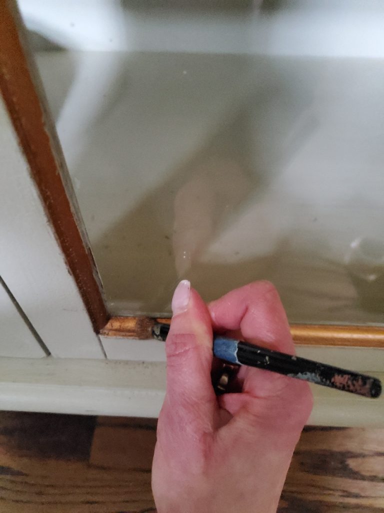 adding wax with a stencil brush