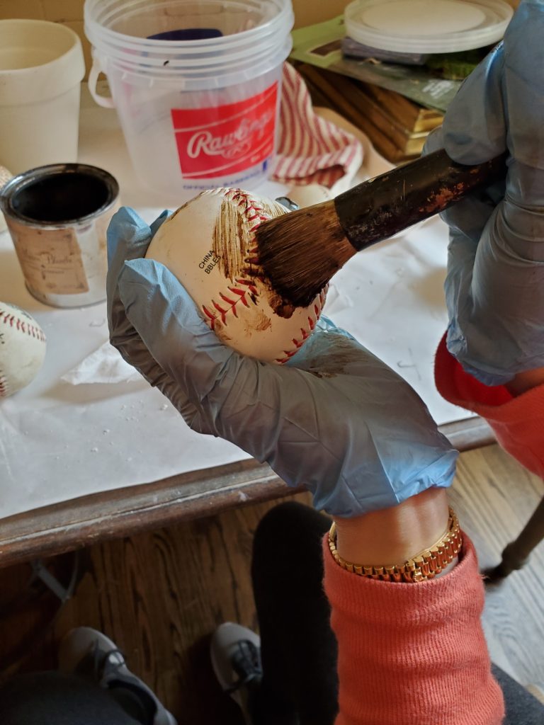 adding wax with a stencil brush