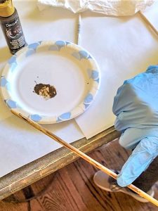adding-brown-paint-to-dowel