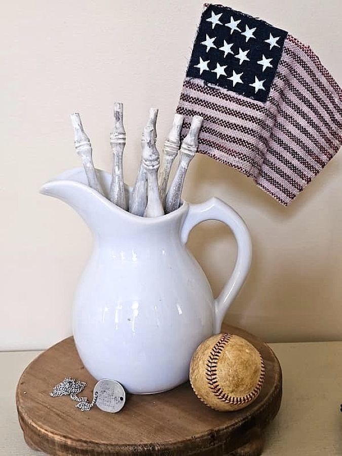diy-patriotic-flags-with-vintage-style.-slag-dyed-in-pitcher-with-spindles-featured-image
