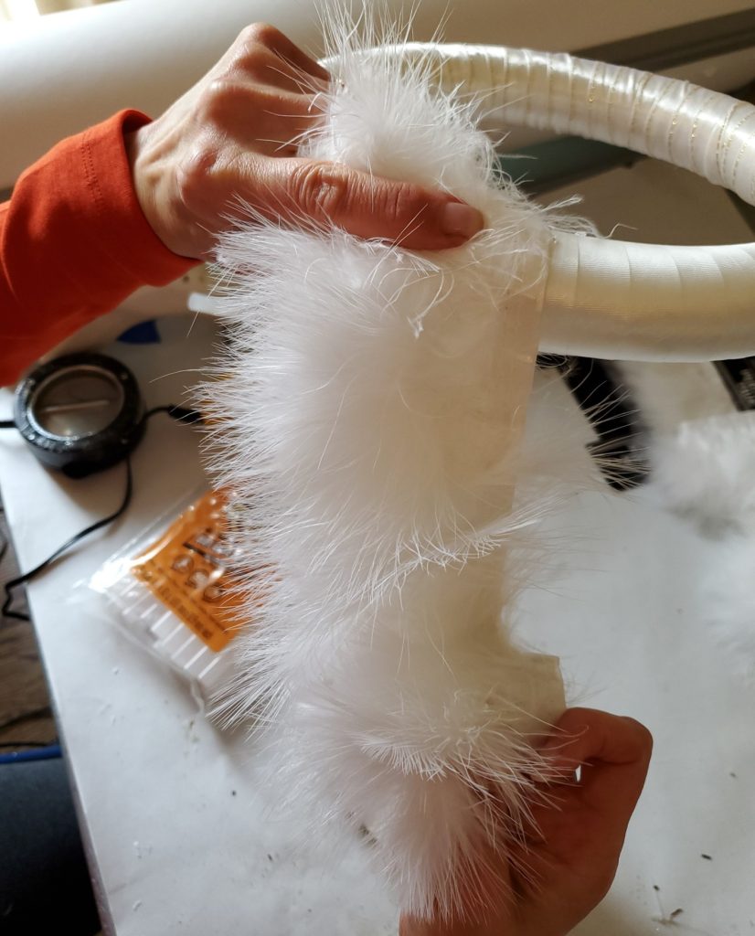 Showing a close up of the fur trim
