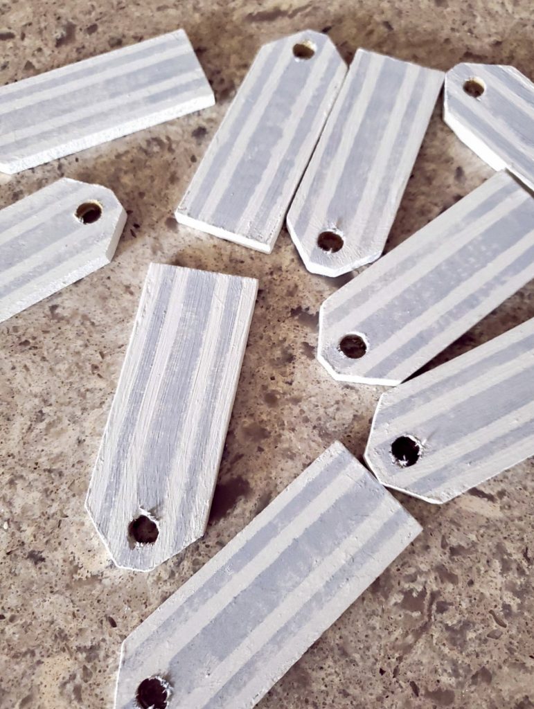 Gift tags after they are painted and stenciled