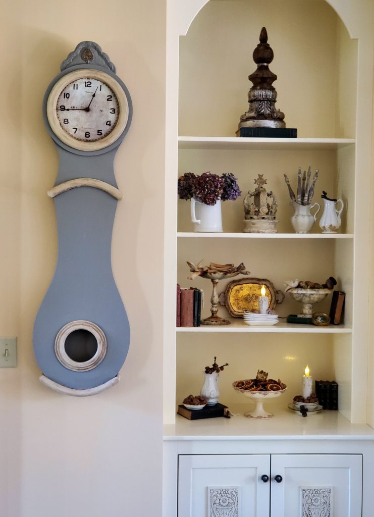 bookcase and the clock natrural fall decor