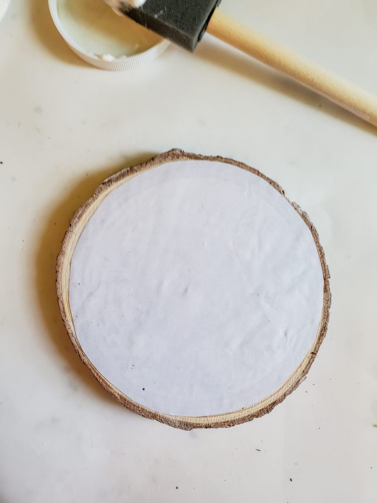 First the fox image is pressed on the DIY wood coasters