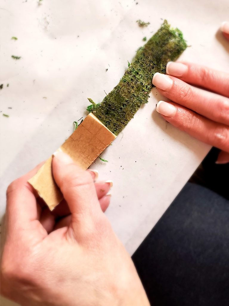 removing-the-paper-off-moss