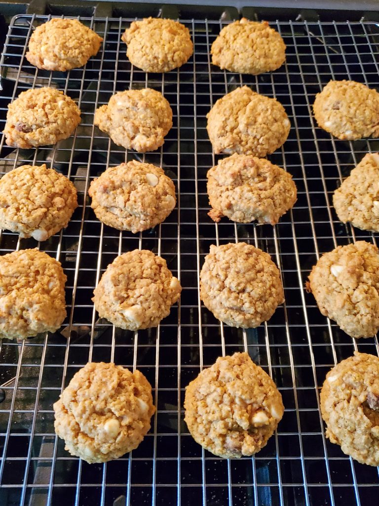 Oatmeal pumpkin chip cookies cooling on a cooling rack