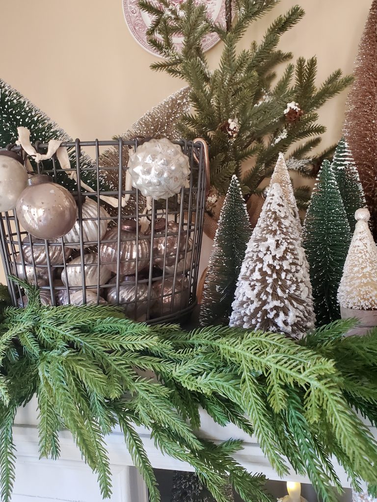 a close up of the garland in a vintage French Christmas