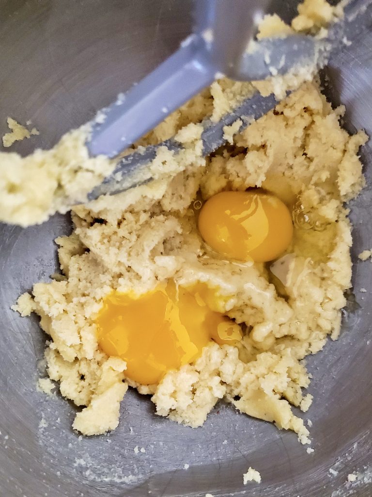 the ingredients in a mixer getting combined together