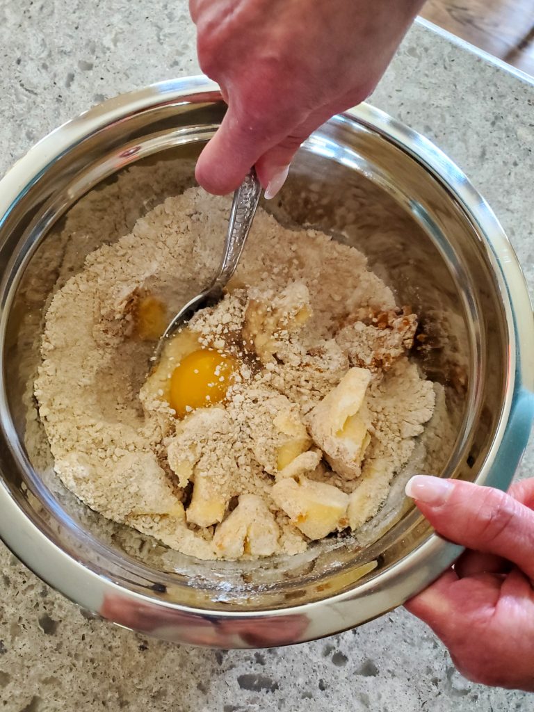 combining the ingrediants together with a spoonm