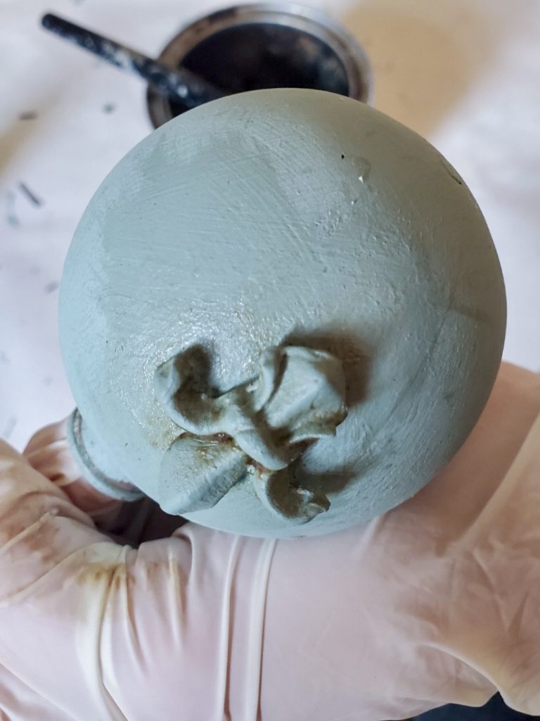showing the piece after adding the dark wax