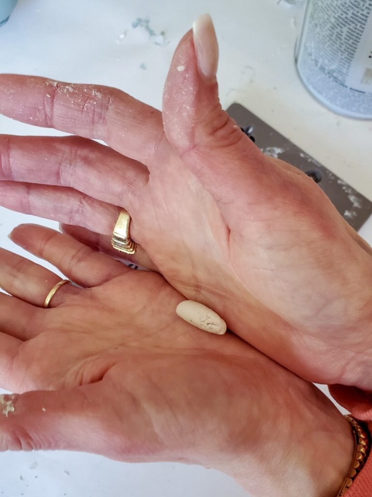 paer clay in a log in my hands 