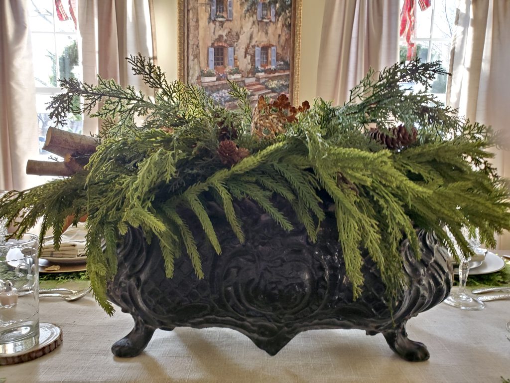 picture of the centerpiece for christmas time in the dining room