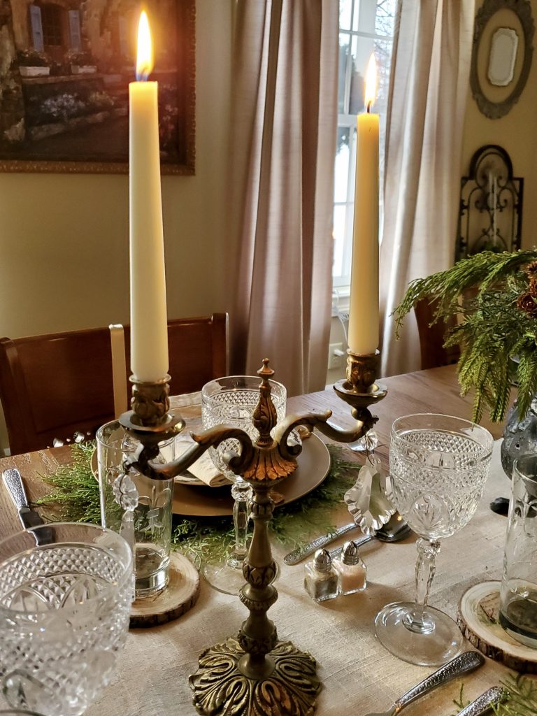 showing the candles lit and a close up of the candle sticks