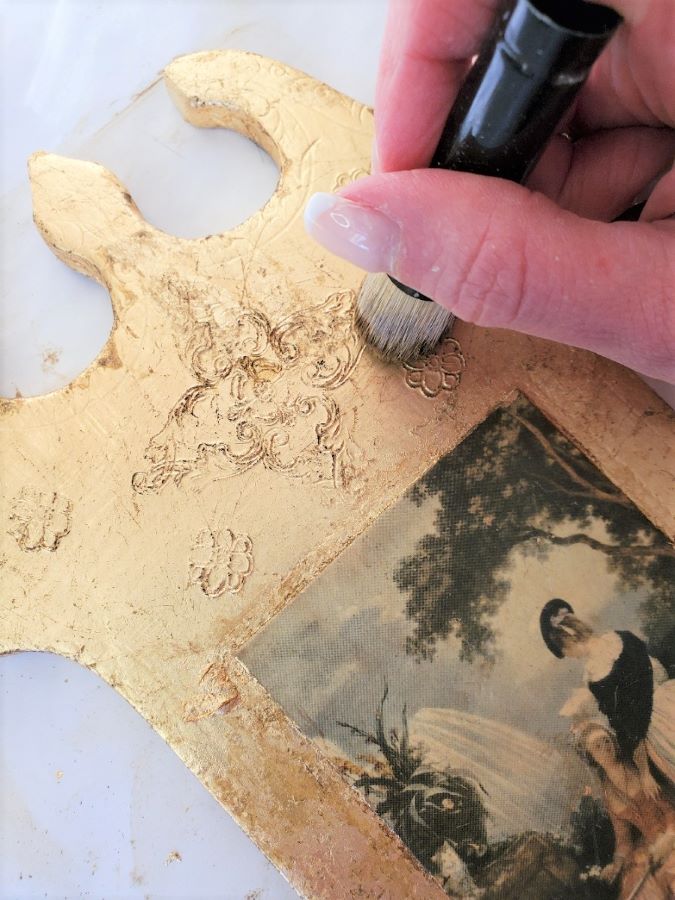 dark waxing over gold leaf
