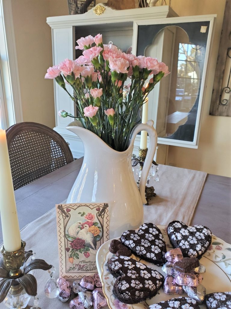Easy Heart Shape Chocolate Brownies showing a vintage dove Valentine card