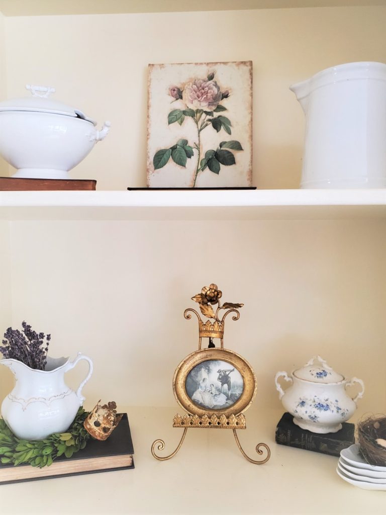 A peony canvas, ironstone pieces.
A Pitcher, Florentine picture and a sugar bowl