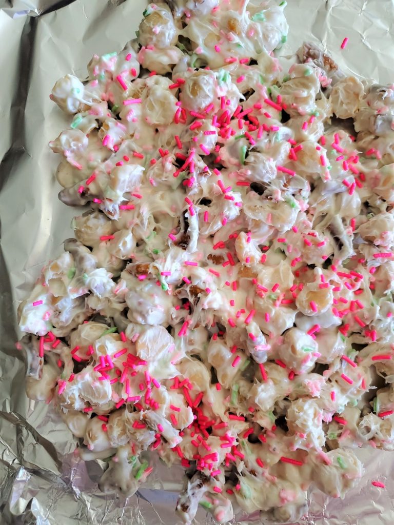 7 Easy Semi Homemade Easter Dessert Ideas white chocolate covered macadamia nuts with bright pink sprinkled
