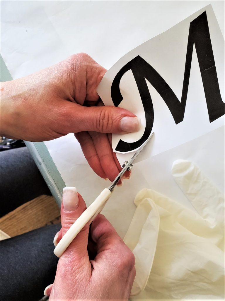 Cutting-out-the-letter-M