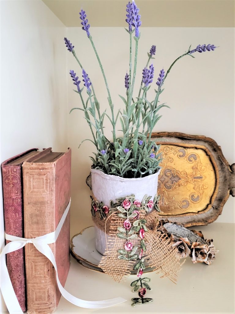 5-ways:-to-styl- country-artificial-lavender-potslavender-on-bookshelf-with-burlap-ribbon-and-books