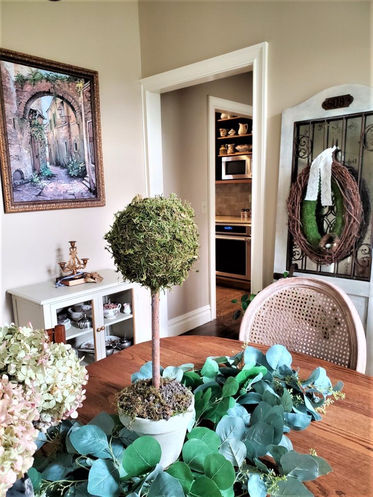moss topiary on a table